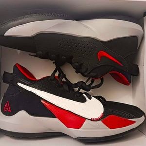 Brand new never worn boys Giannis basketball shoes, size 4.5 red and black